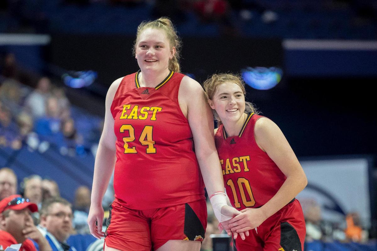 Bullitt East’s Gracie Merkle (24) and Emma Egan (10) celebrated during the fourth quarter of the Chargers’ 66-42 win over Southwestern in the Mingua Beef Jerky Girls’ Sweet 16 semifinals.