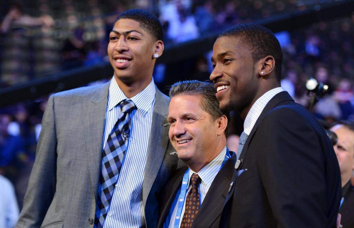 John Calipari poses with Anthony Davis, left, and Michael Kidd-Gilchrist, right, before the 2012 NBA draft. The former UK men’s basketball coach positioned the Wildcats program as a pipeline to the pros during his 15 years in Lexington. More of his former players are expected to be selected when the two-night 2024 draft begins Wednesday.