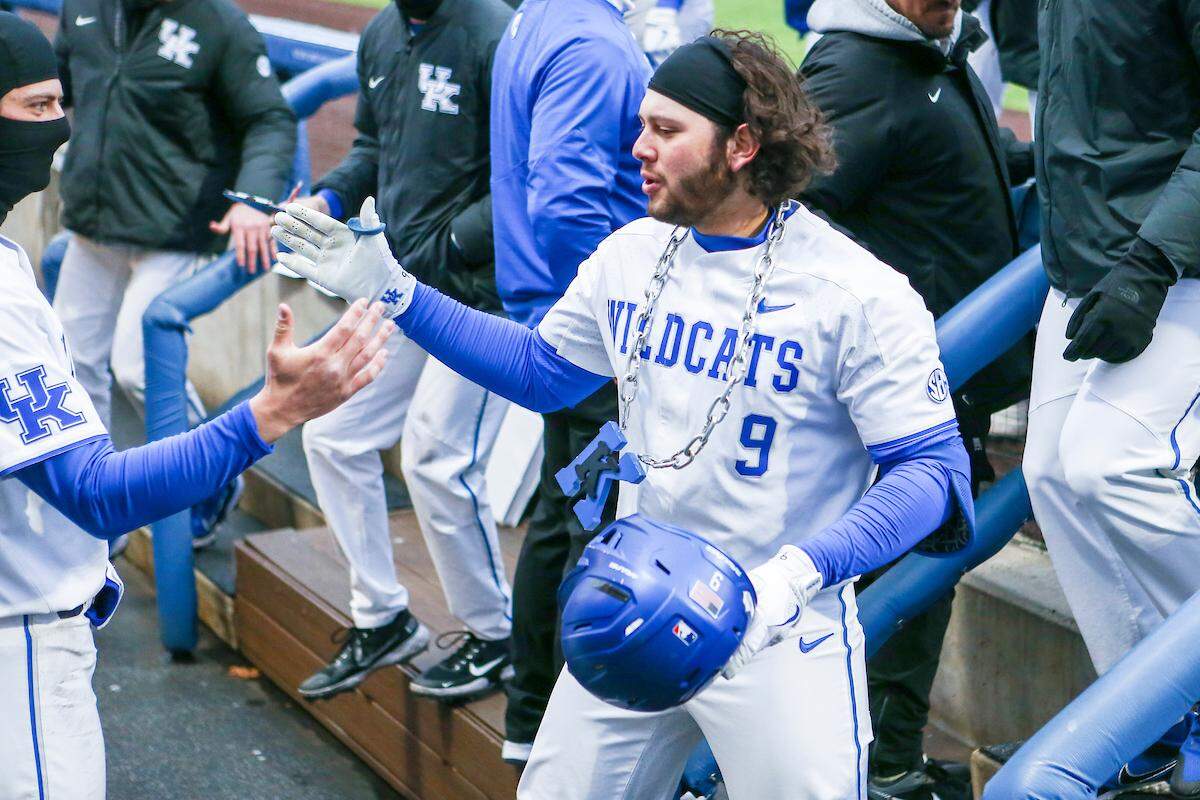 Kentucky senior catcher Alonzo Rubalcaba celebrates in the dugout after hitting a home run during Friday’s 14-3 home win against Western Michigan.