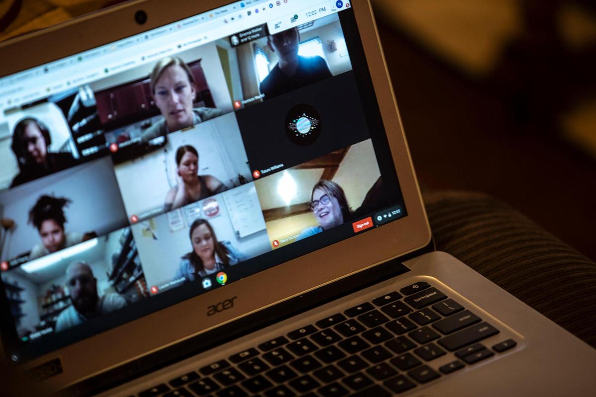 Macy, bottom right, attends a class virtually while at her grandma’s house in Frankfort, Ky., Tuesday, Sept. 15, 2020.