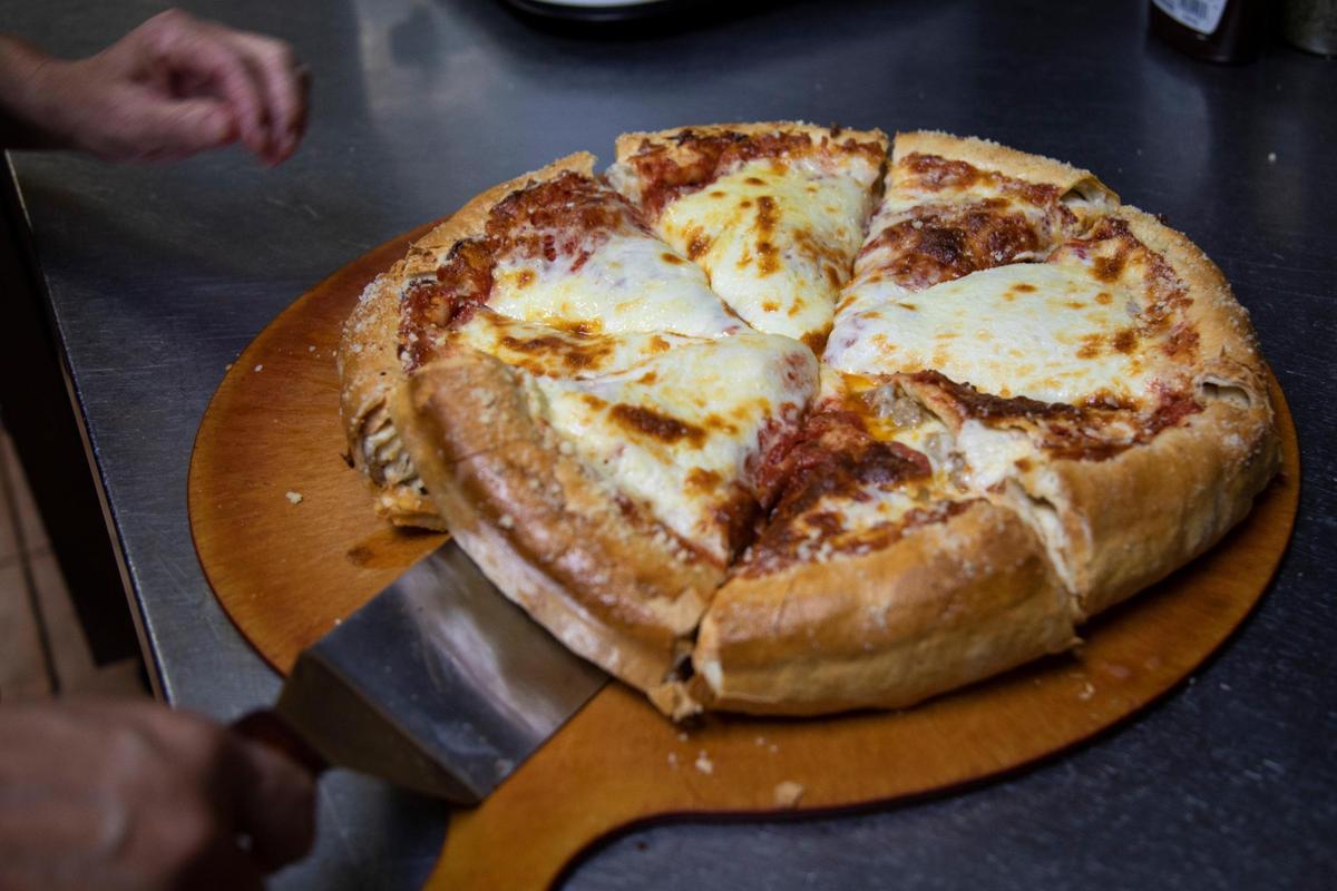 Stellian’s 8-pound deep dish stuffed pizza has eight slices.