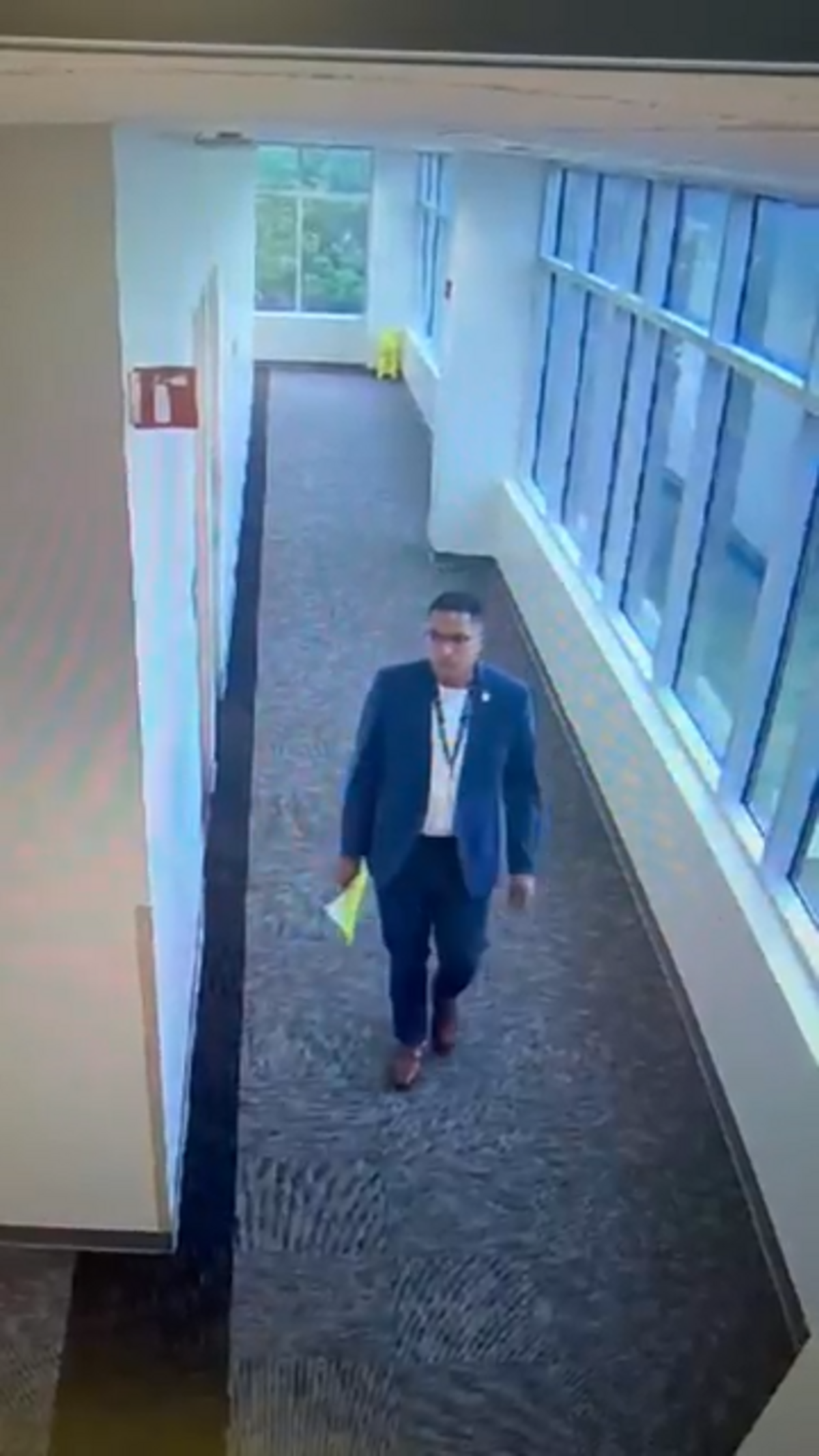 A video obtained by WKYT allegedly shows Fayette County Schools Superintendent Demetrus Liggins slipping a piece of paper under the office door of Rep. Adriel Camuel, a district employee. Camuel’s lawyer says the paper was a threatening email.