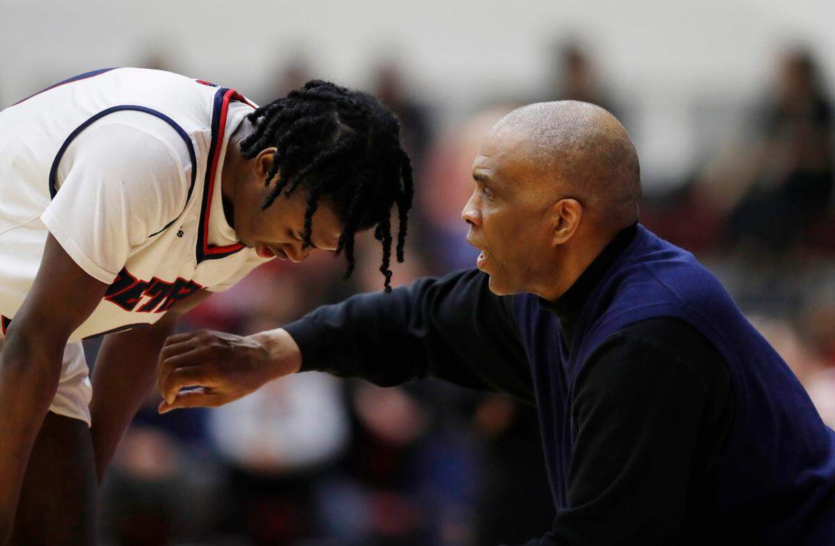 Detroit Mercy head coach Mike Davis talked with his son and Titans leading scorer Antoine Davis. Mike Davis said his team, which finished 8-23 last season, should be vastly improved in 2020-21.