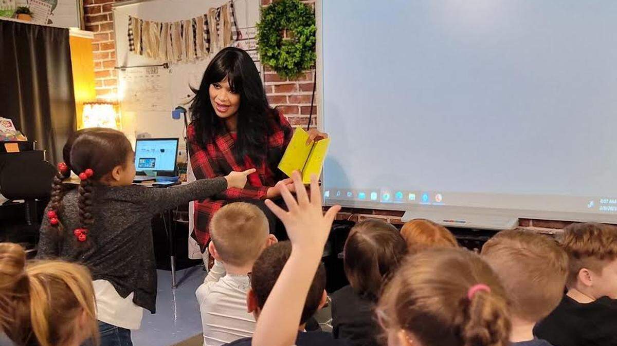 Berea Independent Schools Superintendent Diane Hatchett reads to students in February 2023.