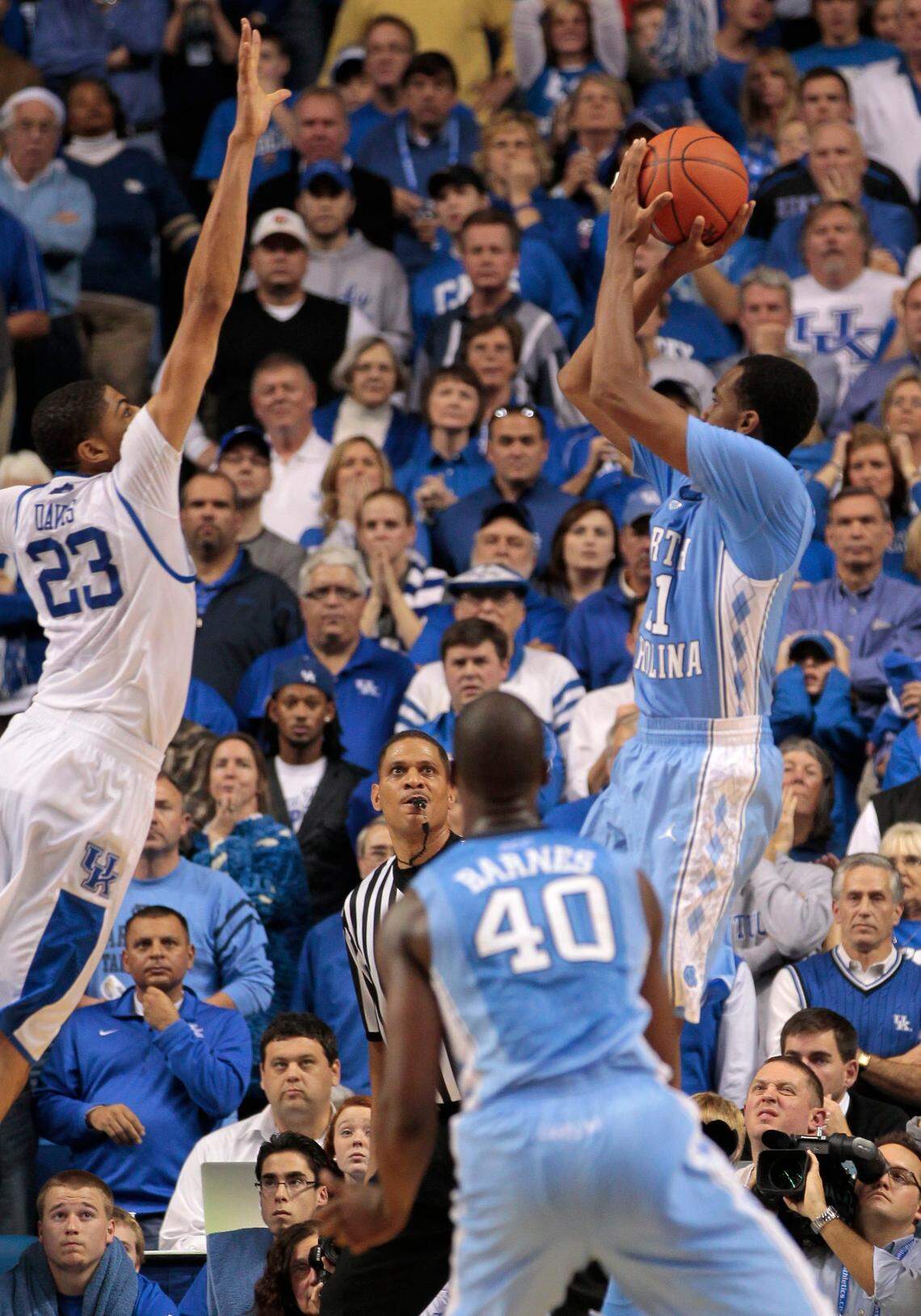 Kentucky’s Anthony Davis blocked a last-second shot attempt by North Carolina’s John Henson to preserve top-ranked UK’s 73-72 win over North Carolina in Rupp Arena in 2011.
