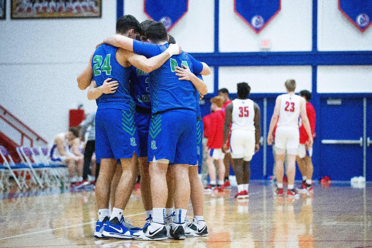 North Laurel’s players huddled before taking on Madison Central in Richmond on Tuesday night. The Jaguars improved to 17-0 with a 90-69 victory.
