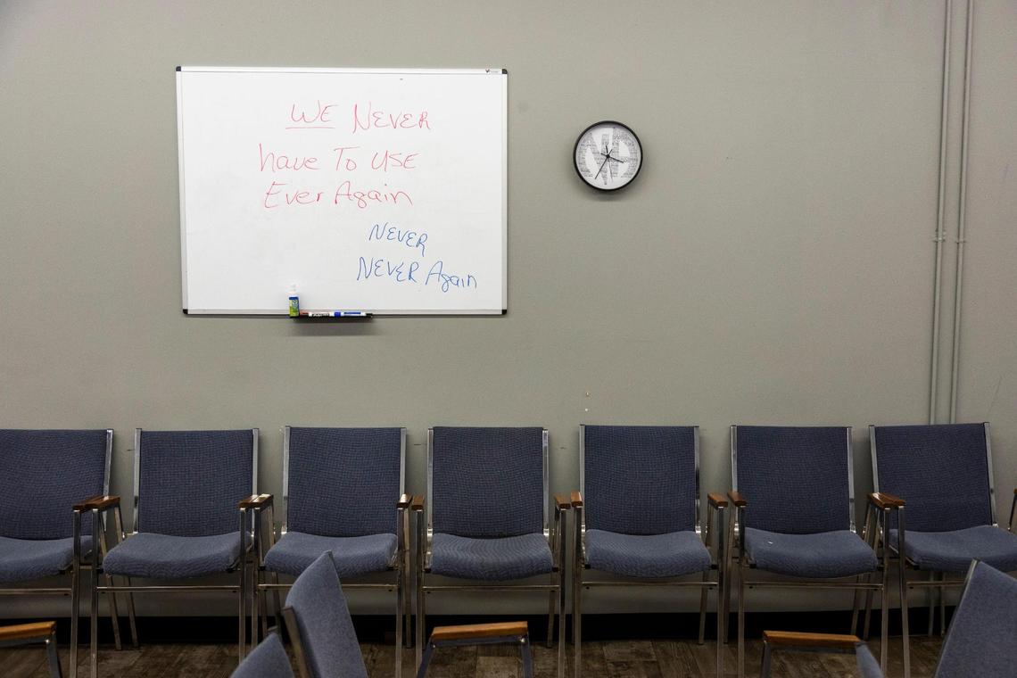 A message reading “We never have to use ever again, never never again,” on a whiteboard where the Narcotics Anonymous meetings take place in Manchester, Ky., Thursday, September 29, 2021.