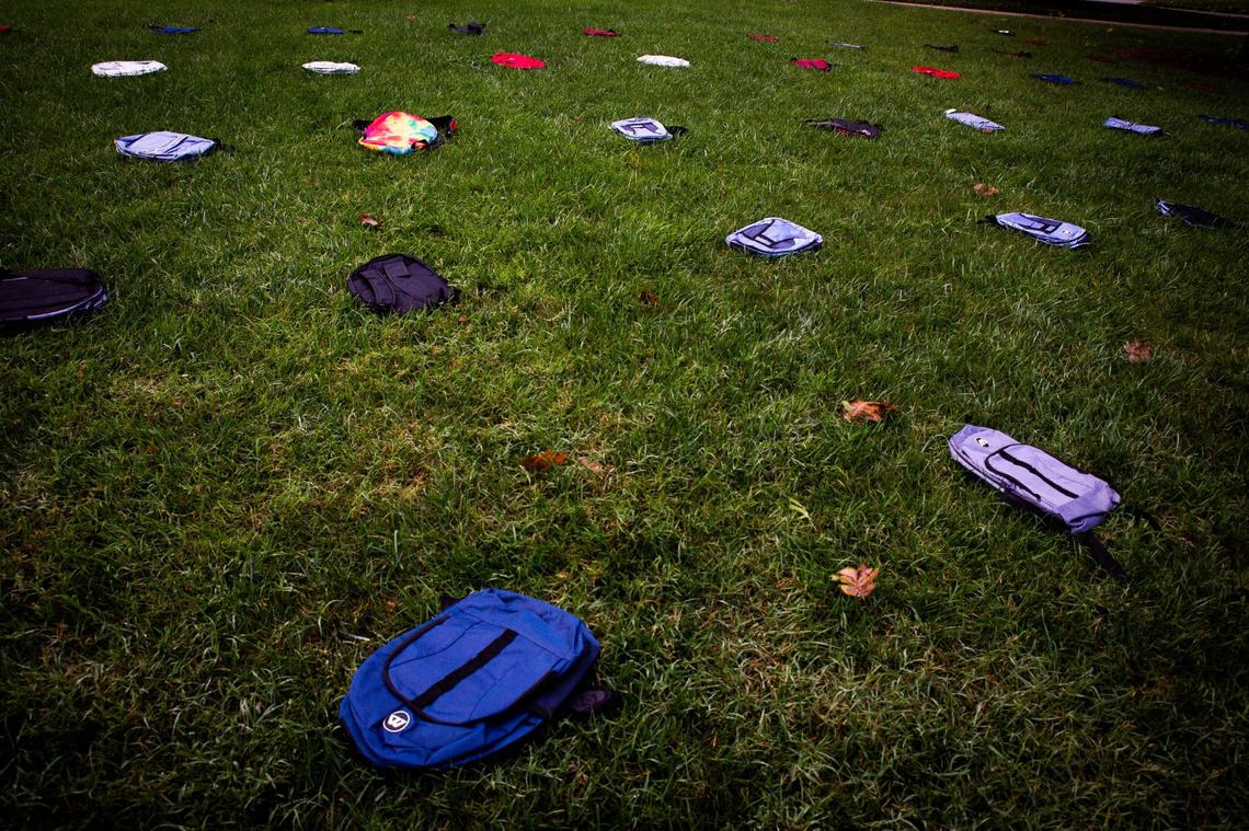 Members of the Movement for Black Lives UK and United Campus Workers Kentucky placed 70 backpacks on the lawn in front of the Main Building on the University of Kentucky campus in Lexington, Ky, on Thursday, September 17, 2020, to represent the number of projected student deaths due to COVID-19.