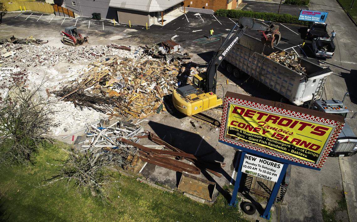 A crew from Diversified Demolition worked to tear down Detroit’s Famous Coney Island restaurant on Lane Allen Road in April.