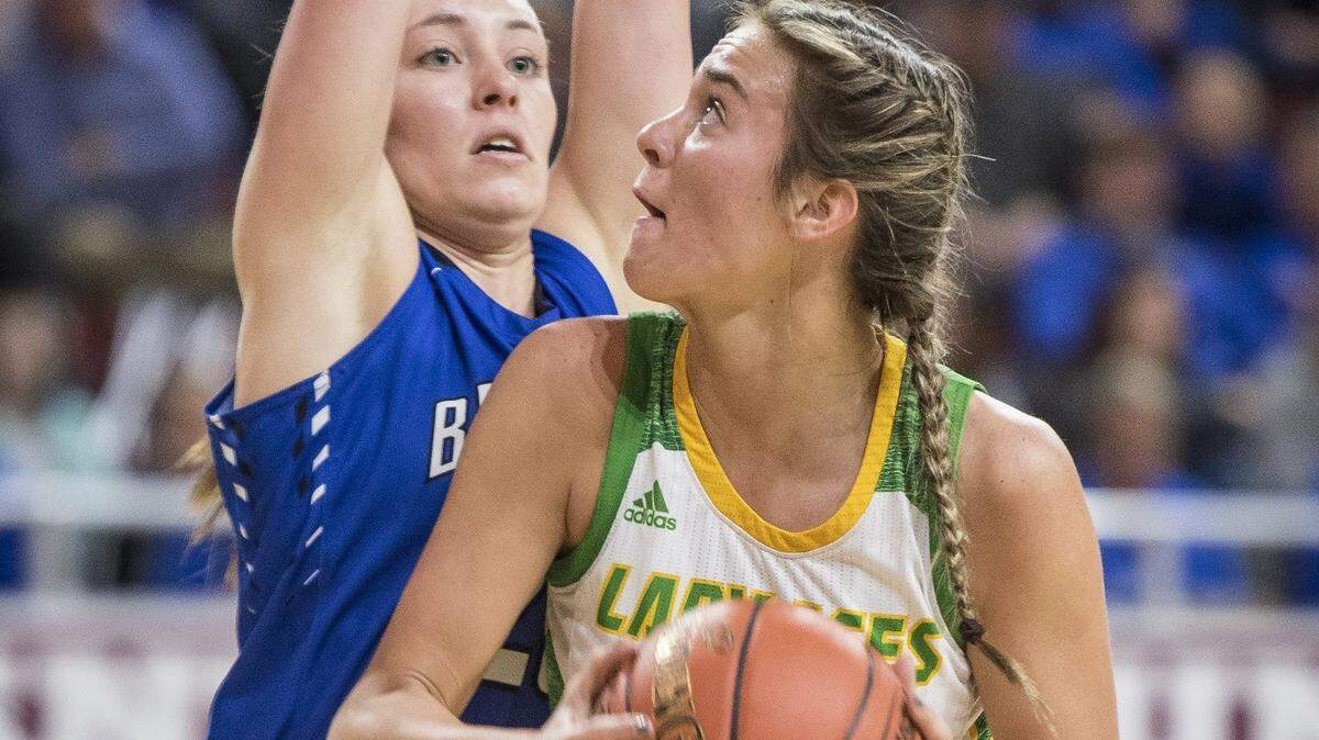 Owensboro Catholic’s Hannah McKay scored 18 points and was 8-for-8 from free-throw line to go along with 11 rebounds in Owensboro Catholic’s 46-32 win over Apollo in the 9th District championship game..