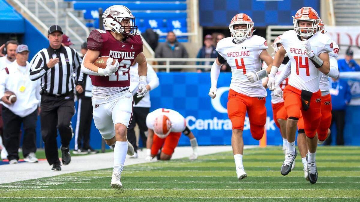 Pikeville’s Blake Birchfield (12) ran 85 yards for a touchdown on the first play from scrimmage in Friday’s Class A state championship game at Kroger Field in Lexington. Birchfield rushed for 231 yards and three touchdowns in the Panthers’ win.