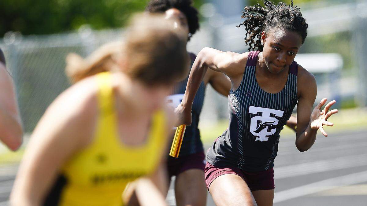 Tates Creek's Naturi Robinson competed in the girls 4x100 meter relay during the Class 3A, 6th Region track meet Saturday at Henry Clay High School. 