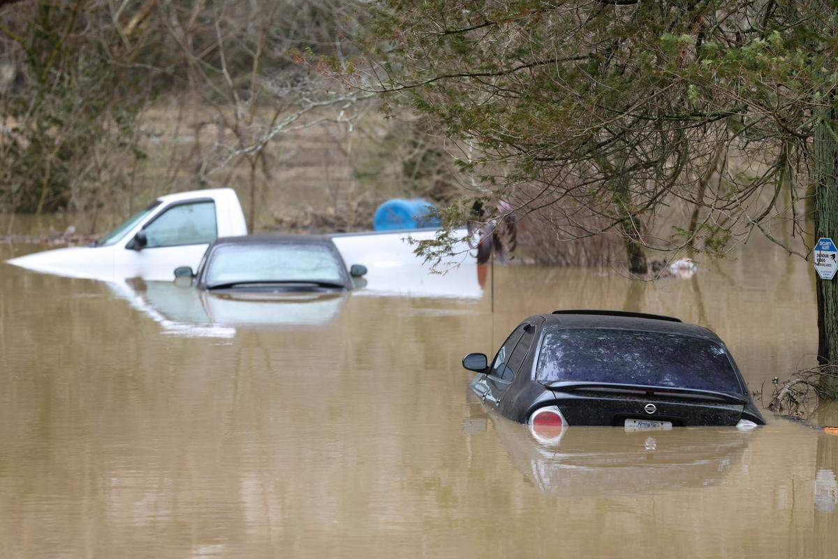 Flooding along the Kentucky River caused some vehicles to be submerged in water on Lexington’s Beach Road on Monday, March 1, 2021.