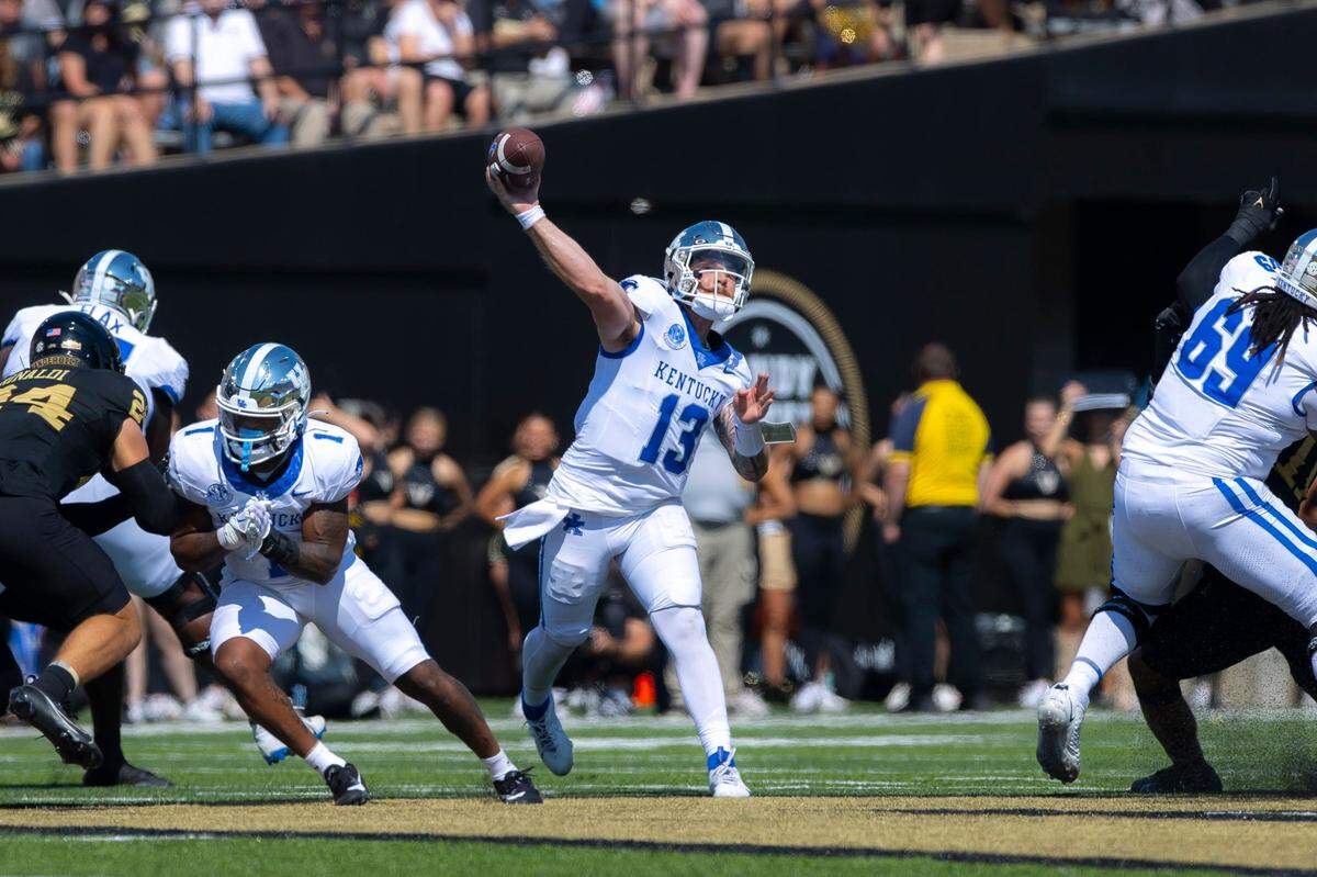 Devin Leary (13) has thrown for 1,060 yards and nine touchdowns with five interceptions through four games for Kentucky.
