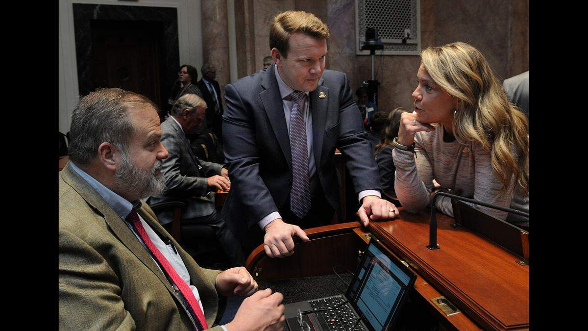 Louisville Republican Rep. Jared Bauman (middle) is lead sponsor of House Bill 5.