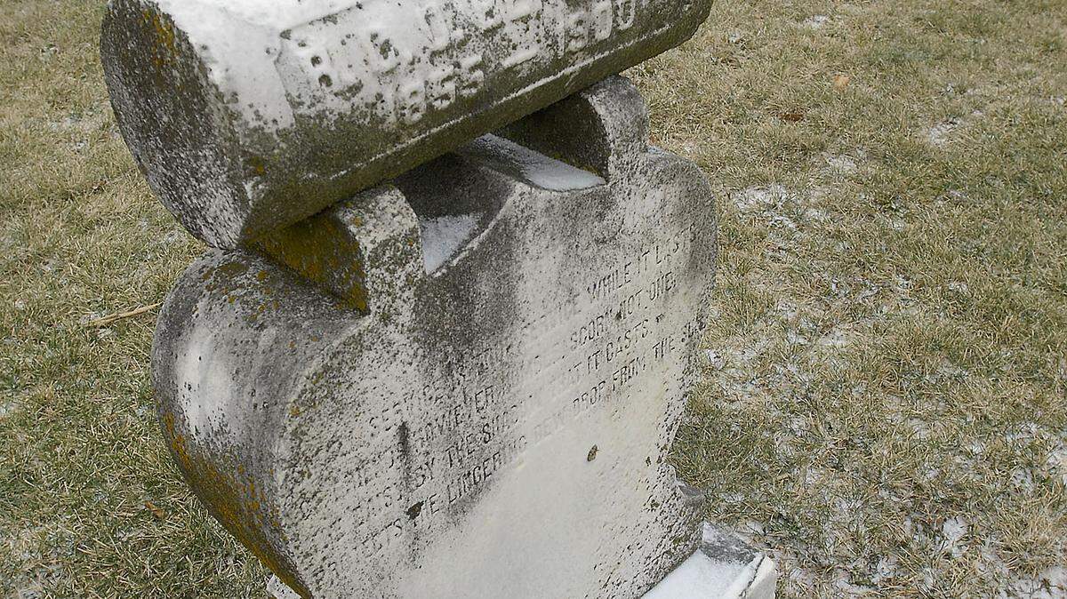 The headstone of 19th-century activist Robert Charles O'Hara Benjamin at the African-American Cemetery on Seventh Street.  