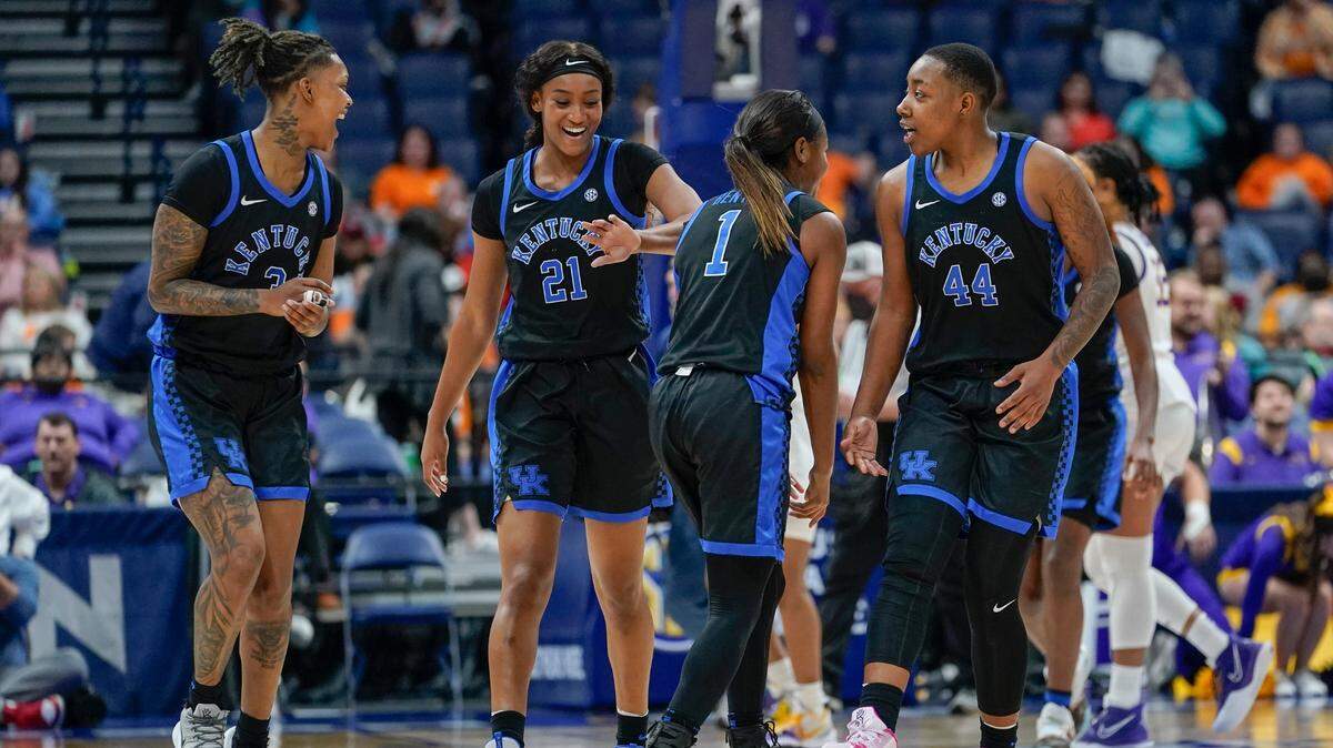 Kentucky players celebrate after defeating LSU in the Southeastern Conference Tournament on Friday in Nashville.