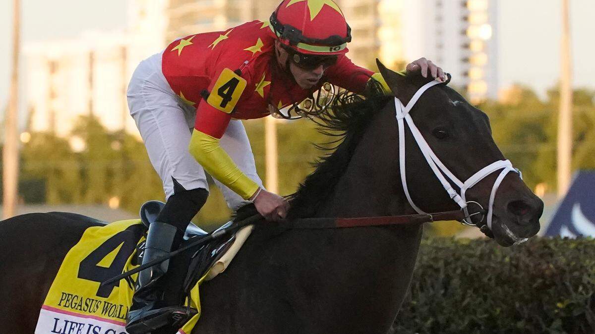 Jockey Irad Ortiz Jr., riding Life is Good, celebrates after winning the Pegasus World Cup in January. Life Is Good will take aim at Flightline in the Breeders’ Cup Classic at Keeneland on Saturday.