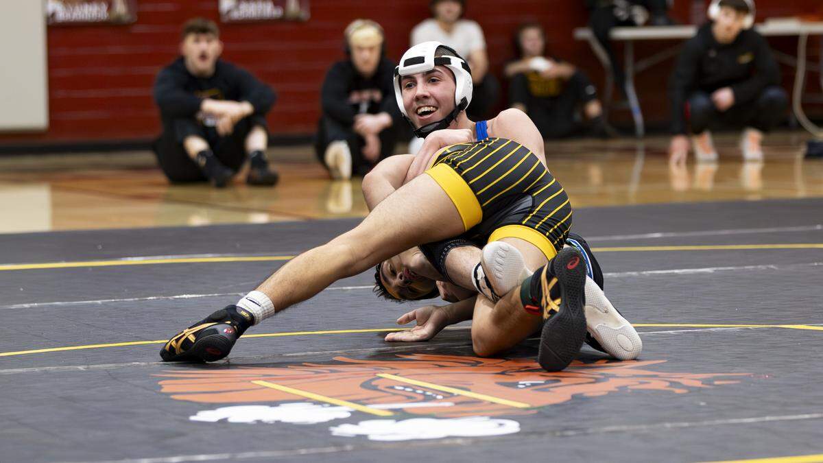 East Jessamine’s Logan Plummer smiled as he closed out a victory over Harrison County’s Noe Rodriquez in the 106 finals at the KHSAA Boys/Co-ed Region 6 Wrestling Championships at Harrison County High School in Cynthiana on Saturday.