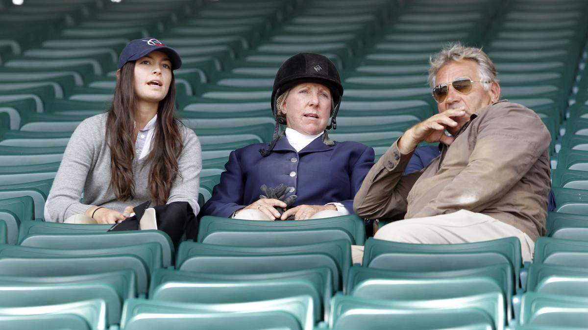 17-year-old Reed Kessler, left, with her coaches, Katie and Henri Prudent, watched the early competitors navigate the course before she competed in the Open Jumpers Class at the Kentucky Spring Horse Show at the Kentucky Horse Park on Iron Works Rd. in Lexington, Ky. Thursday,  May 10, 2012. Reed Kessler, 17, is a top show-jumping Olympic hope and her family has just bought a horse farm in Lexington. The horse show runs thru Sunday. Photo by Charles Bertram | Staff