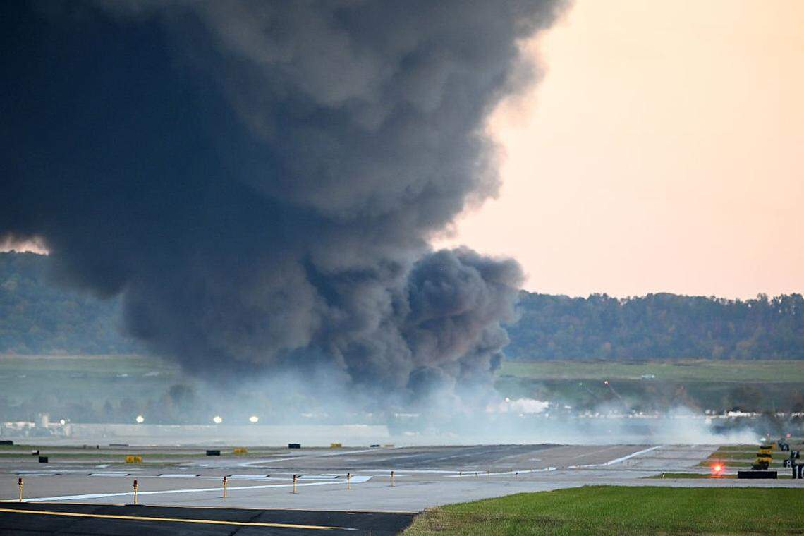 LOUISVILLE, KENTUCKY - NOVEMBER 04: Fire and smoke mark where a UPS cargo plane crashed near Louisville Muhammad Ali International Airport on November 04, 2025 in Louisville, Kentucky. The fully fueled plane crashed shortly after takeoff with a shelter-in-place order issued for within 5 miles of the airport. (Photo by Stephen Cohen/Getty Images)