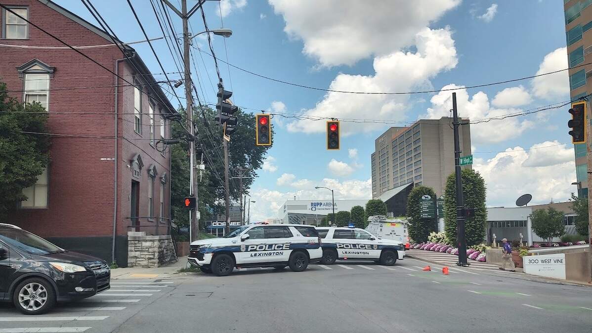 High Street was closed early Saturday afternoon while police investigated a crash after a man reportedly drove off in an officer’s cruiser.