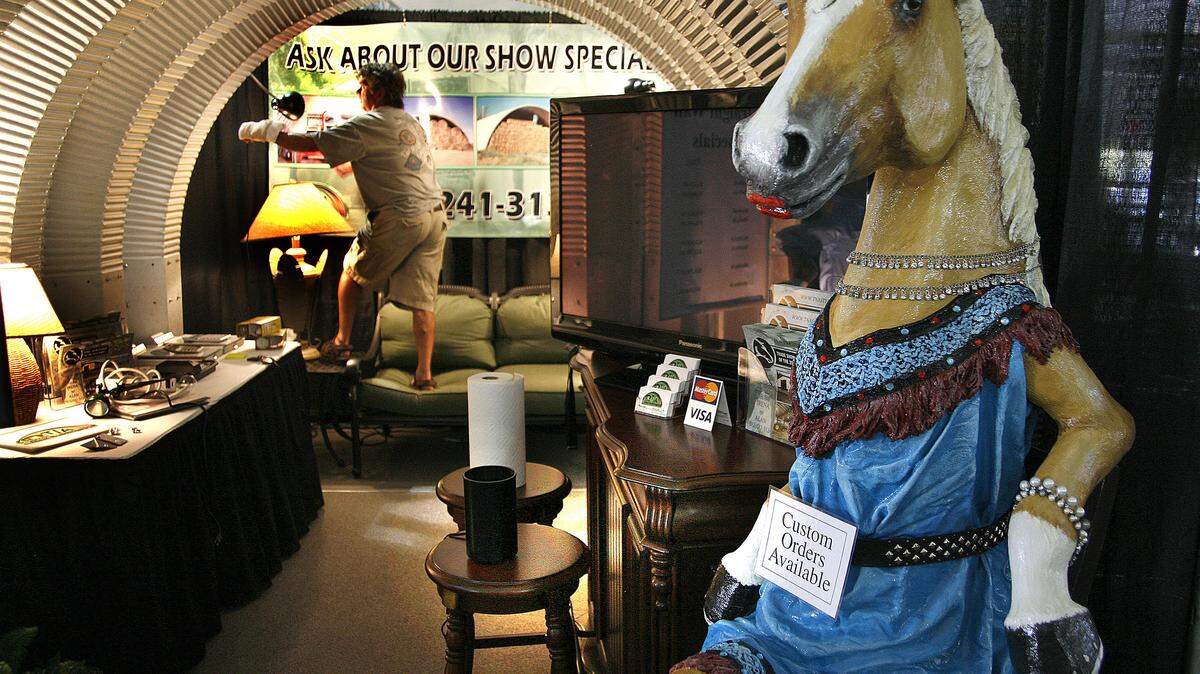 T/A Custom Steel Buildings offer fiberglass hand-painted horses in the color of the buyer's choice at its Trade Show booth at the World Equestrian Games. But T/A is at the Games primarily to sell its steel buildings in various sizes.  
