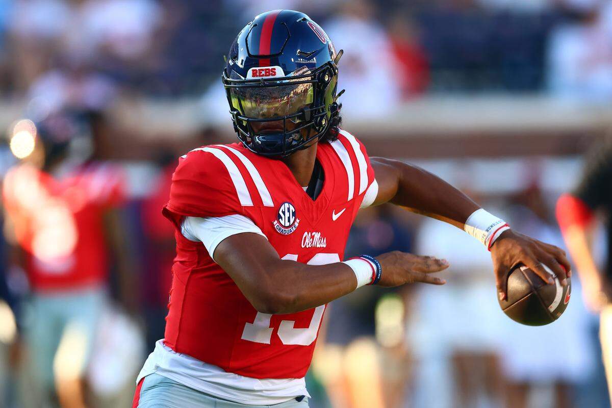  In his first college start, Mississippi quarterback Austin Simmons completed 20 of 31 passes for 341 yards with three touchdown passes and two interceptions in a 63-7 Rebels rout of the Georgia State Panthers.
