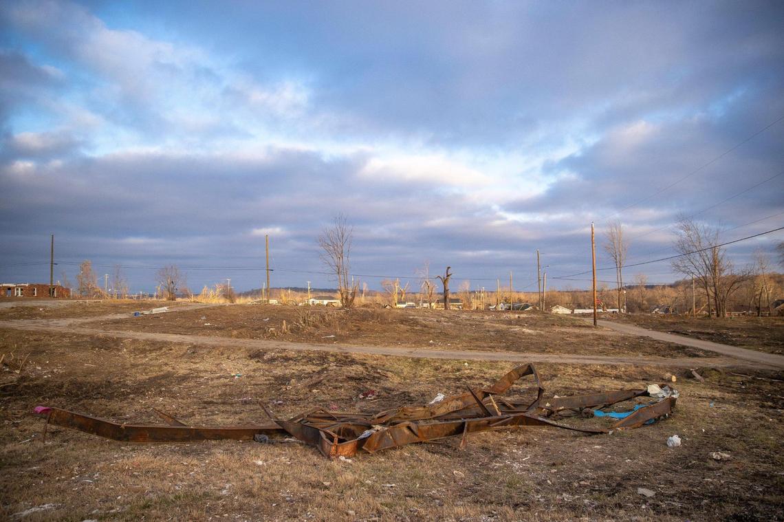 The steel frame of Geneva Adamson’s trailer is all that remains on the site of the home in Dawson Springs, Ky., Friday, Feb. 11, 2022.