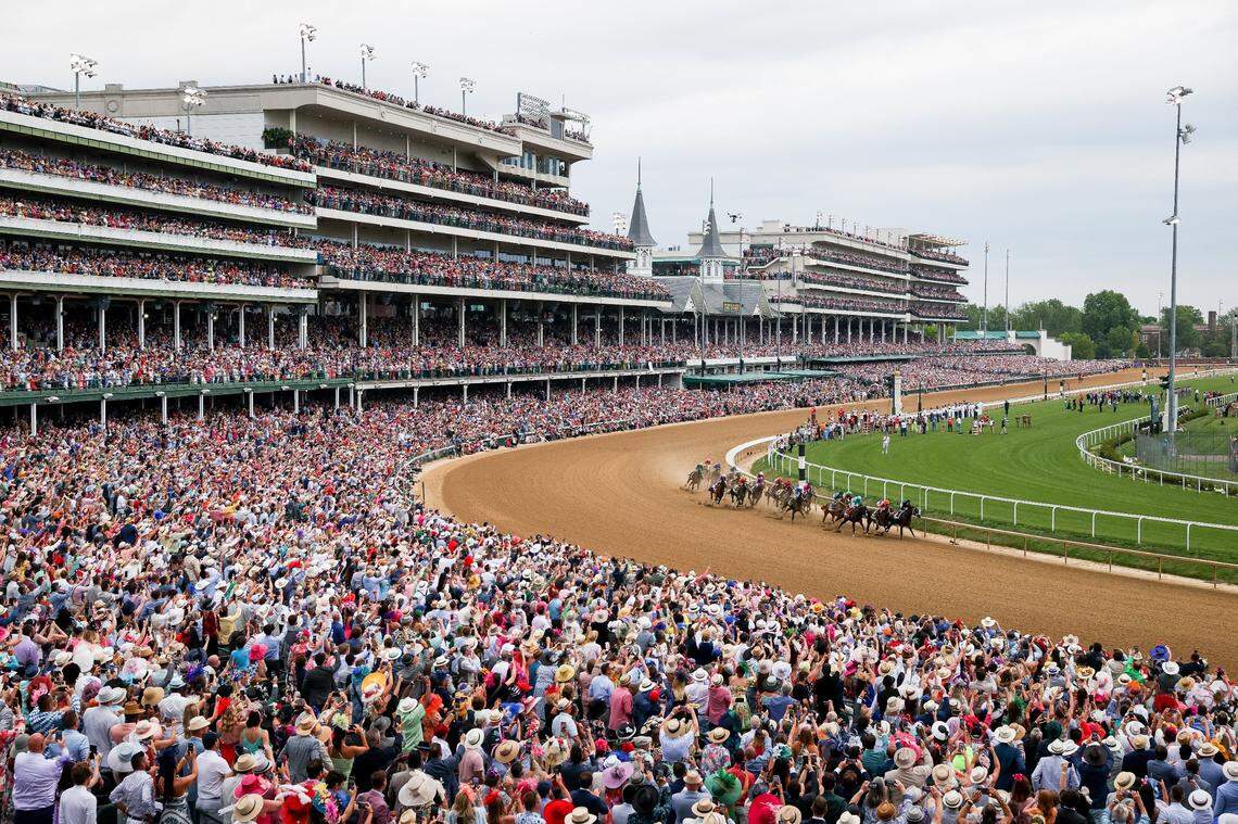 The field rounds the first turn during the 149th running of the Kentucky Derby at Churchill Downs on Friday, May 6, 2023, in Louisville, Ky. (Jack Weaver/Herald-Leader)