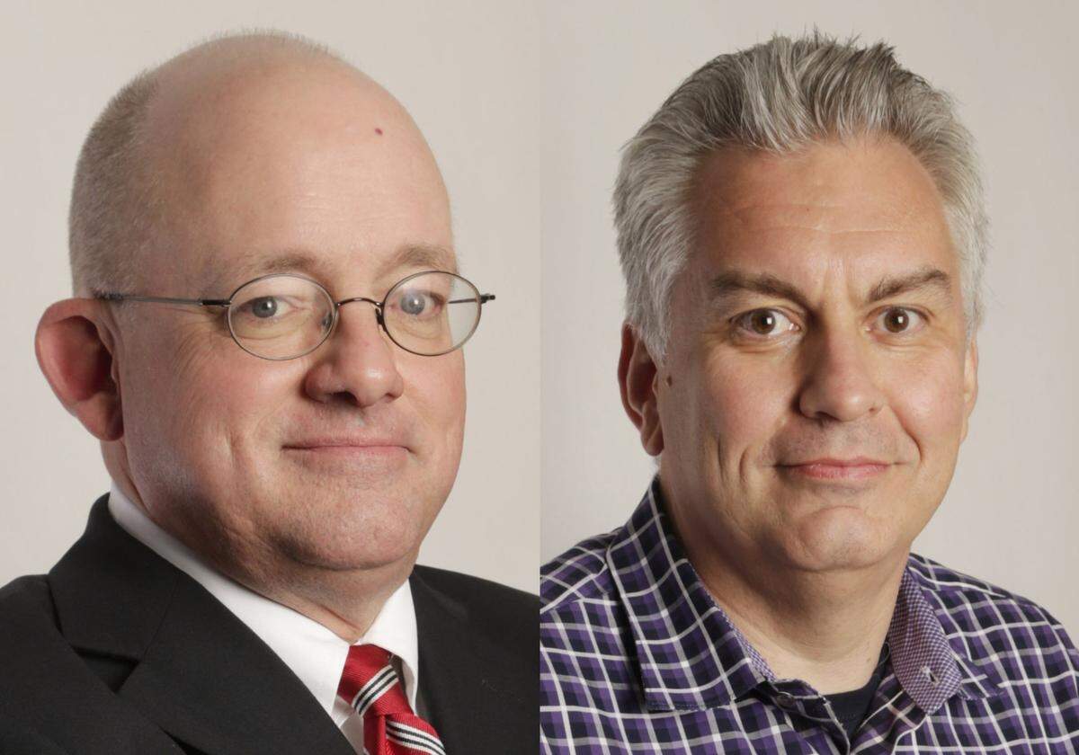 Herald-Leader sports columnists John Clay, left, and Mark Story.