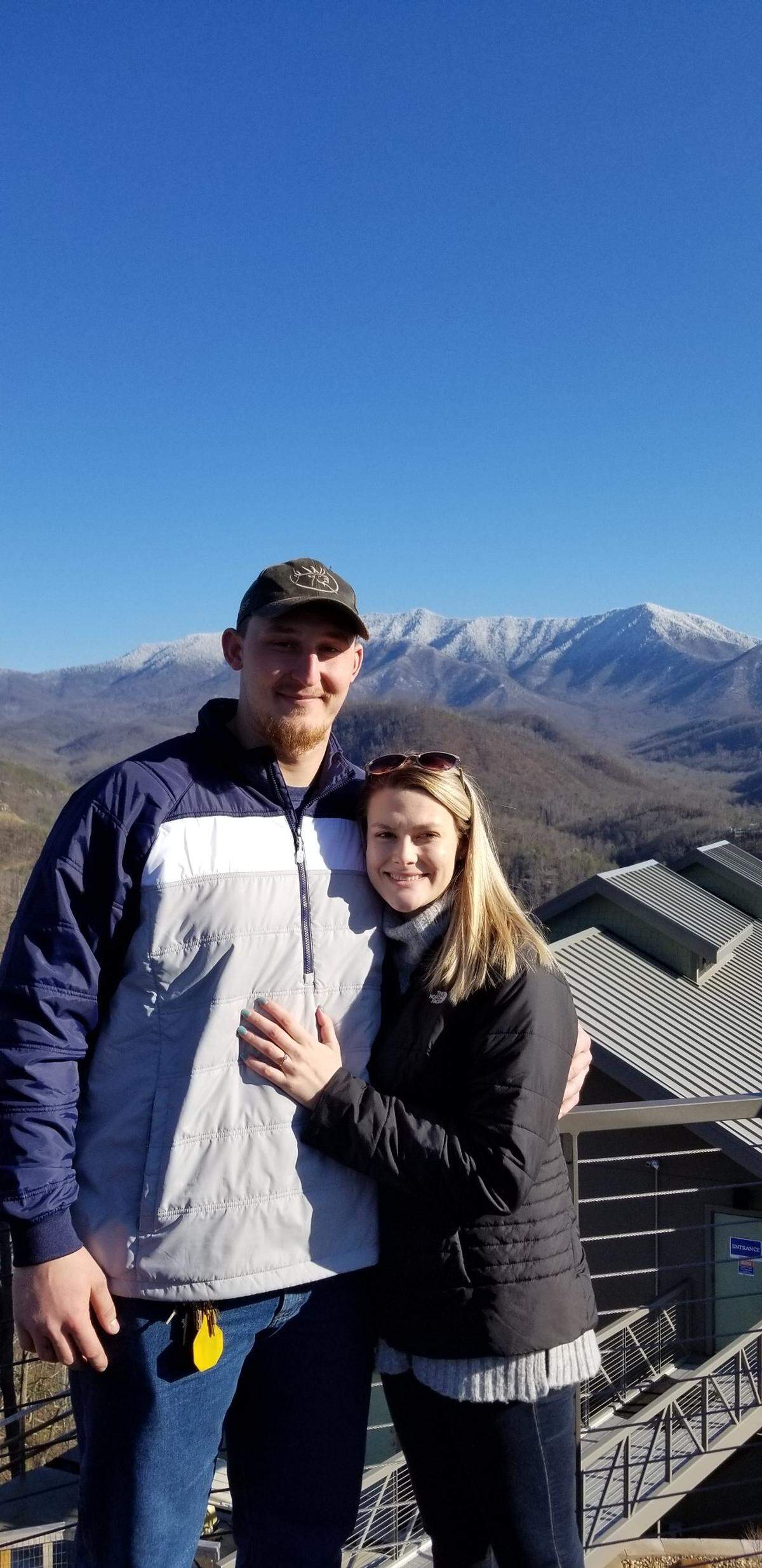 University of Kentucky offensive tackle Landon Young, left, proposed to his girlfriend, Haleigh Johnson, during a trip to Gatlinburg with their families on Saturday. “It’s a really good experience and I hope lots of other people on the team can be able to experience that one day.”