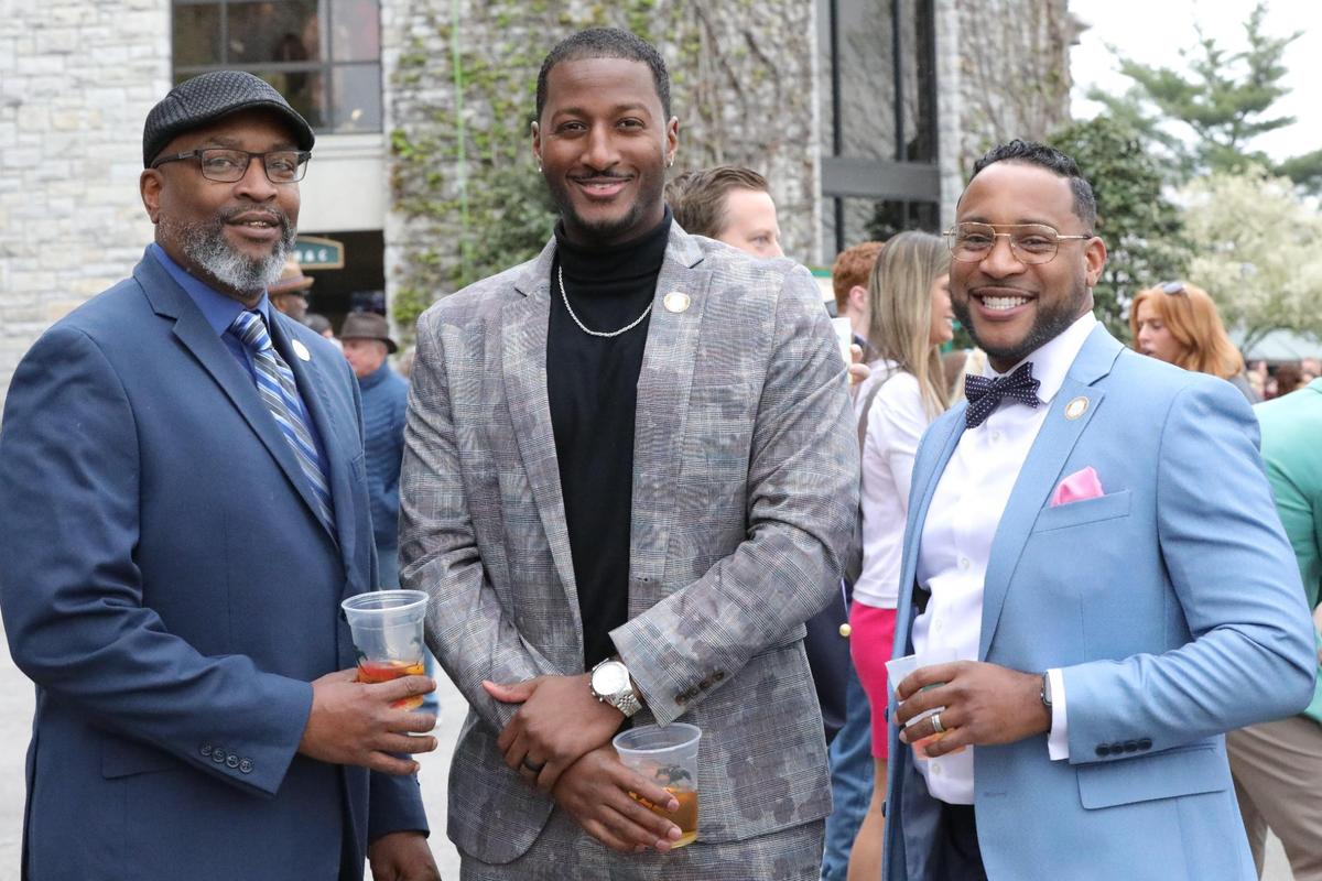 Opening day at Keeneland brought out its annual array of spring fashions among visitors trying to fight off the chill and maintain appearances.