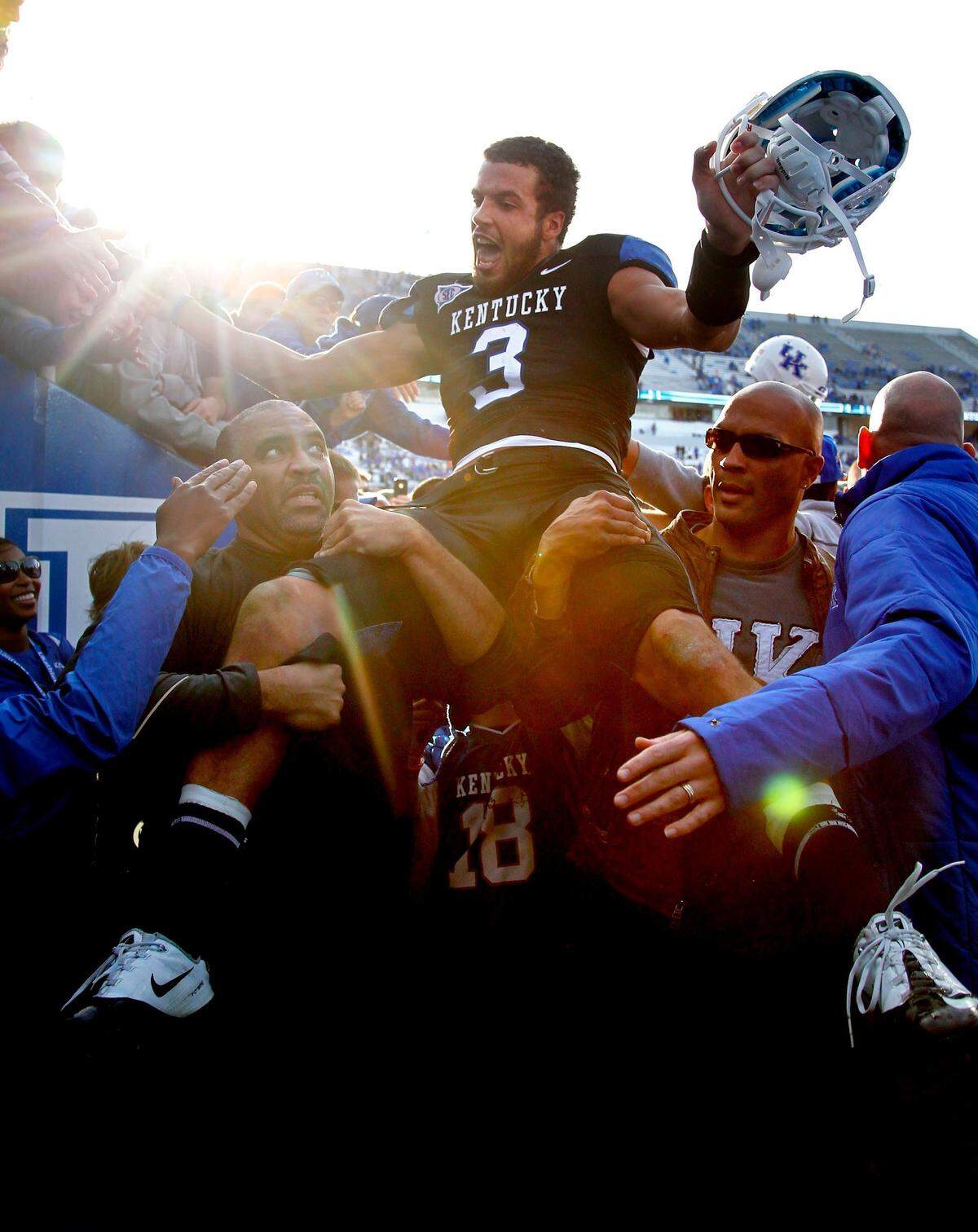 Kentucky quarterback Matt Roark (3) got a lift off the  field after Kentucky defeated Tennessee 10-7 in 2011, breaking a 26-game losing streak against the Volunteers.