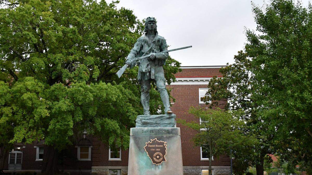 A monument to Daniel Boone overlooks campus on Thursday, July 20, 2023 at Eastern Kentucky University in Richmond, Ky.