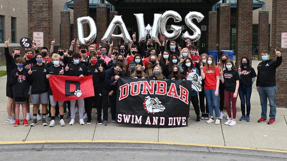 The Paul Laurence Dunbar High School boys’ and girls’ swimming and diving teams gathered for a team photo on April 25 after having earned the combined state championship at the state meet a day earlier.