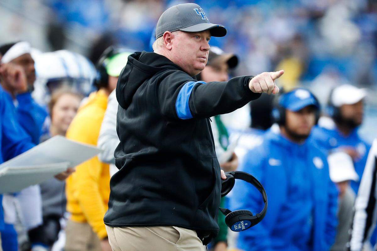 Kentucky Wildcats head coach Mark Stoops motions down field during a game against the New Mexico State Aggies at Kroger Field in Lexington, Ky., Saturday, Nov. 20, 2021.