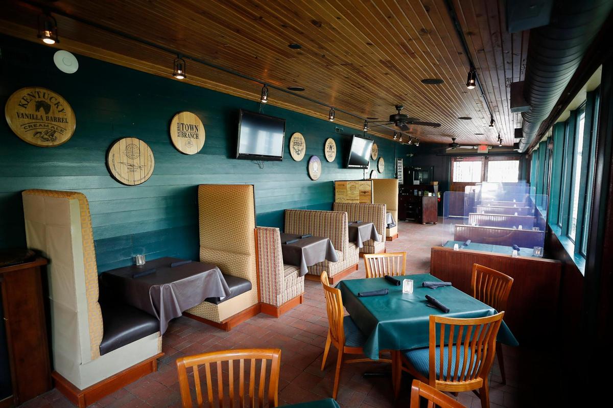 The side dining room at The Goose Lexington is cozy and comforting, with new booths.