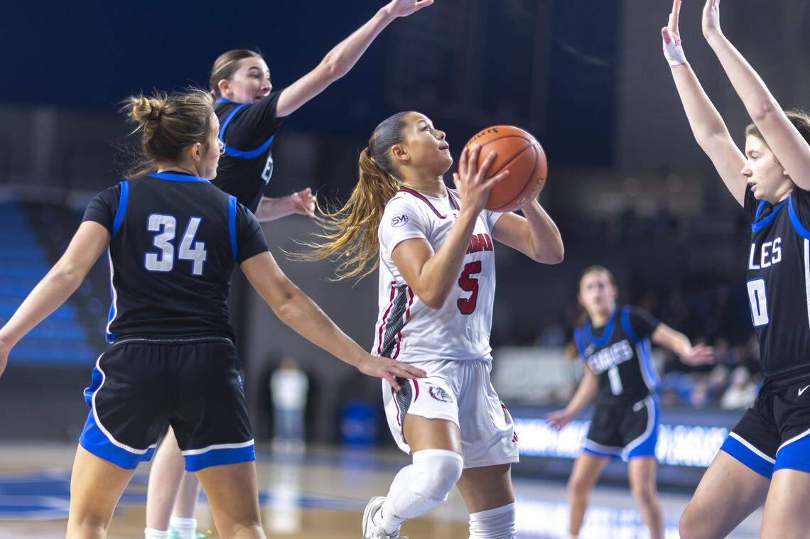 Dubar's Kyah Curtsinger shoots the ball during a game against Lexington Christian at Historic Memorial Coliseum on Friday, Feb. 6, 2026.