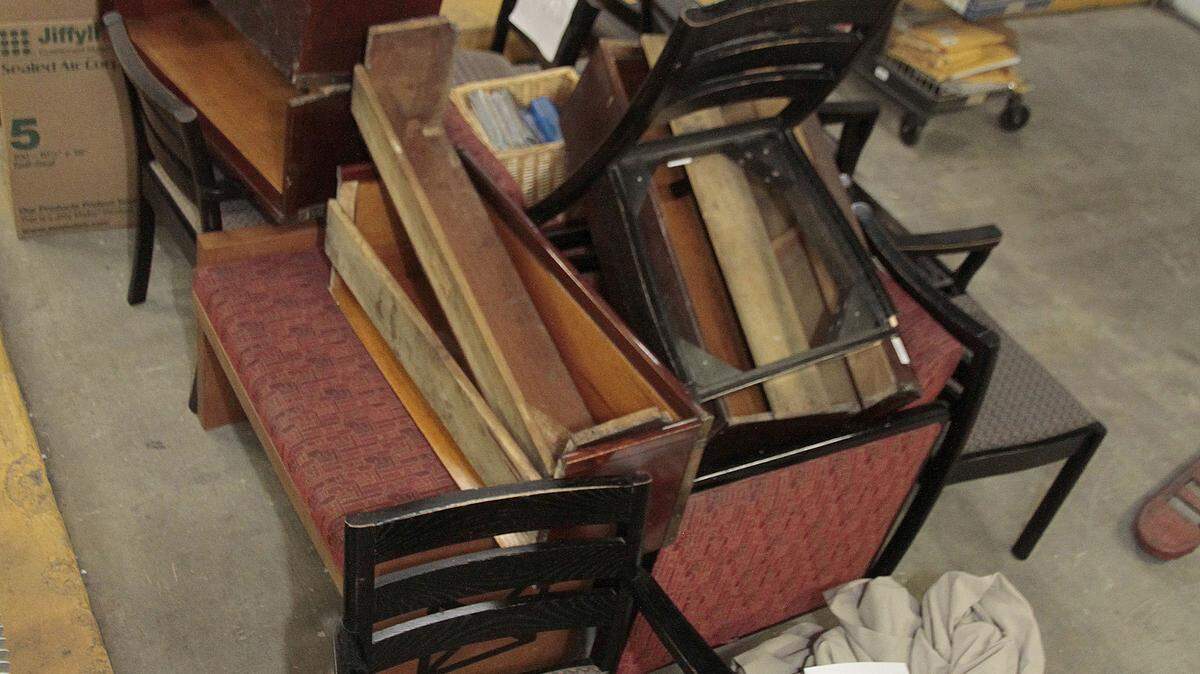 Furniture and other items were stored in the Central  Library's  loading dock to await  Friday's cleaning. A pest control company's bedbug- sniffing dogs indicated there was  evidence of  insects in these  furnishings.             
