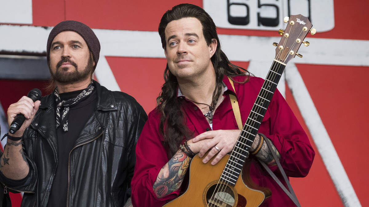 Billy Ray Cyrus, left, and Carson Daly dressed as Billy Ray Cyrus in his "Achy Breaky Heart" glory appear on NBC's "Today" show Halloween special at Rockefeller Plaza on Tuesday, Oct. 31, 2017, in New York. Cyrus in being inducted into the Kentucky Music Hall of Fame May 11.