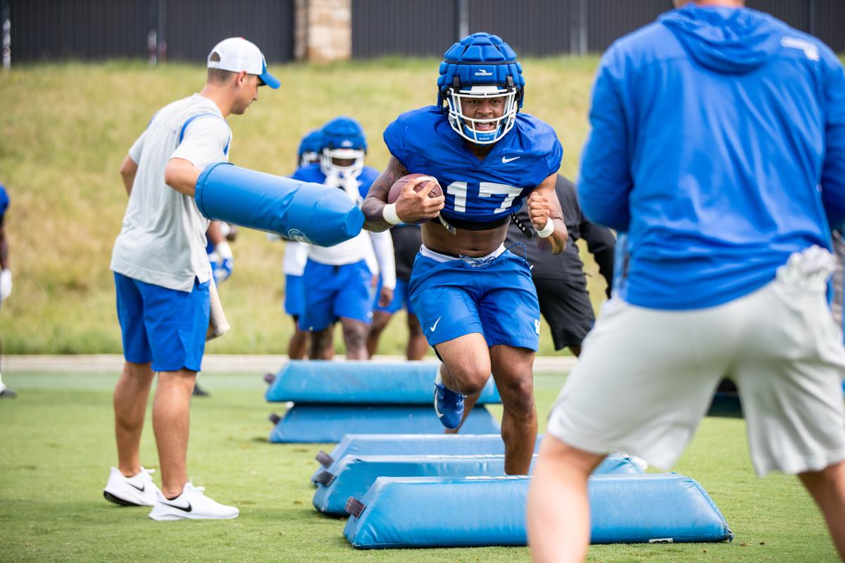 “Once you learn how to read the defenders and find out what man is going somewhere on a certain play, it just helps you and slows things down a lot,” running back JuTahn McClain (17) said.