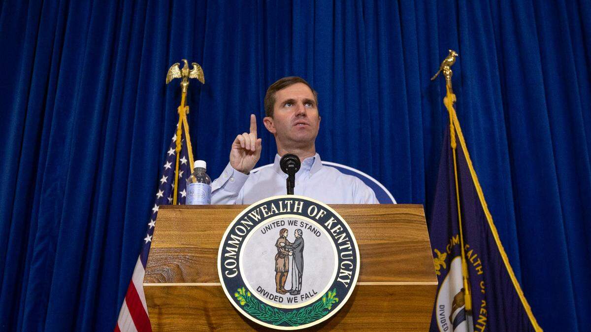 Gov. Andy Beshear announces new cases of the novel coronavirus during a press conferences at the Capitol Rotunda in Frankfort, Ky., Wednesday, August 12, 2020.