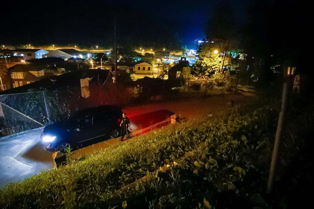 Branham returns to his vehicle after following up on a trespassing call on Jefferson Street in Pikeville.