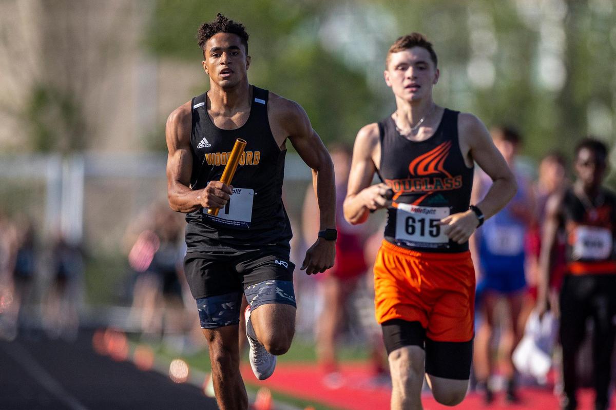 Runners from Woodford County and Frederick Douglass compete in the 4-by-800 relay during Friday’s Class 3A, Region 6 meet at WInchester. Woodford County’s team of Sawyer Ford, Jase Crume, Ryan Hendrix and Jackson Gordon won the event with a time of 8:20.06.