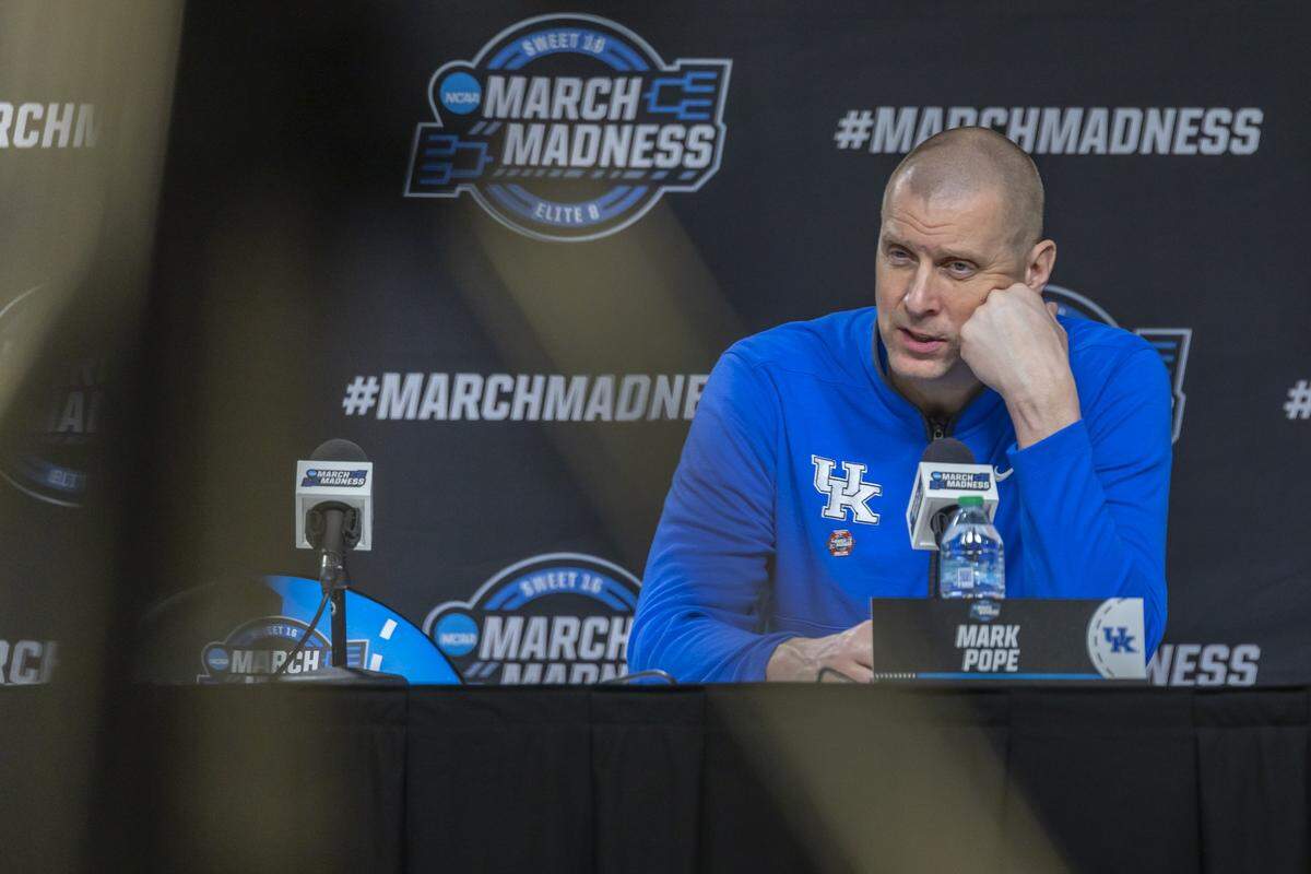 Kentucky head coach Mark Pope talks to reporters following Friday’s loss to Tennessee during a Sweet 16 game at Lucas Oil Stadium in Indianapolis.