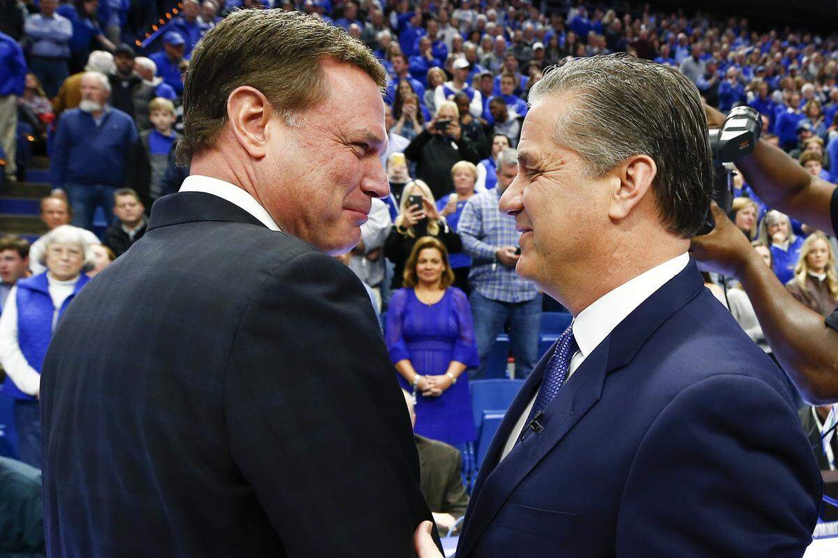 John Calipari, right, will try to keep his program ahead of Bill Self, left, now that Kentucky has retaken the lead over Kansas in all-time wins.