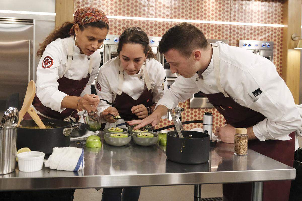 Chefs Lana Lagomarsini, Paula Endara and Vincenzo Loseto compete on the first episode of “Top Chef” in Canada.