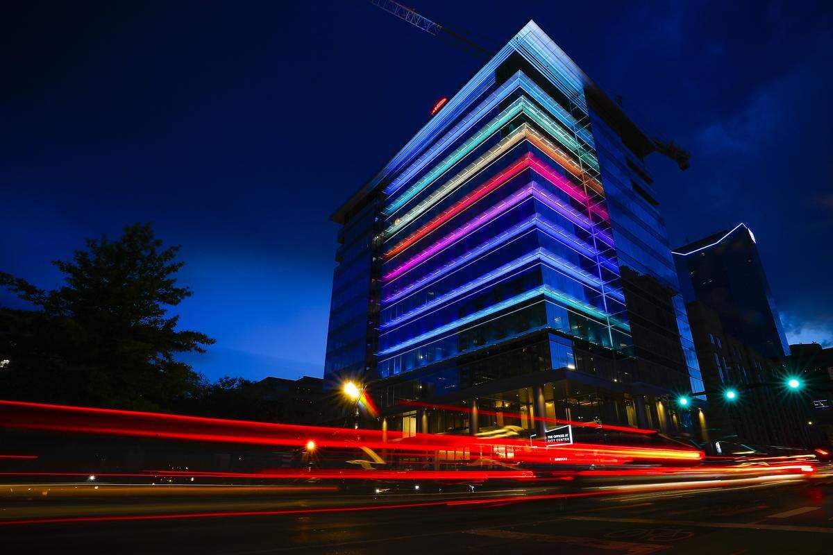 City Center is illuminated in rainbow to celebrate the 2019 Lexington Pride Festival in downtown Lexington, Friday, June 28, 2019.