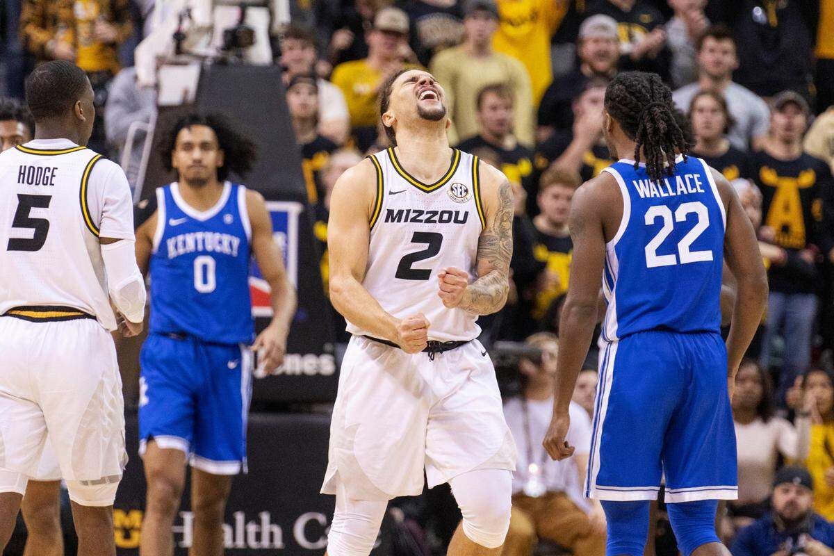 Missouri’s Tre Gomillion screams after a basket during the second half against Kentucky on Wednesday in Columbia, Mo. Missouri won 89-75.